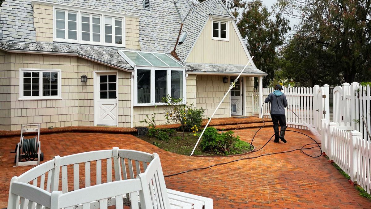 Residential driveway and patio pressure washing by Trip's Windows in Los Angeles