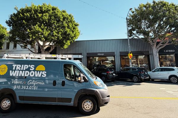 Trip's Windows van at a commercial property for window cleaning service