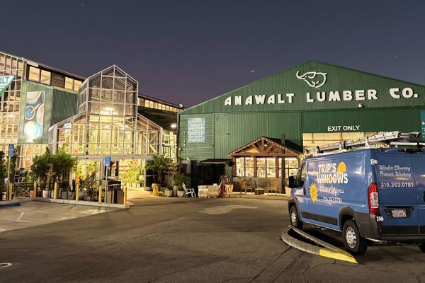 Trip's Windows van at a restaurant location for commercial window cleaning service